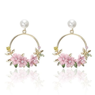 Aretes de Flores y Perlas en Oro