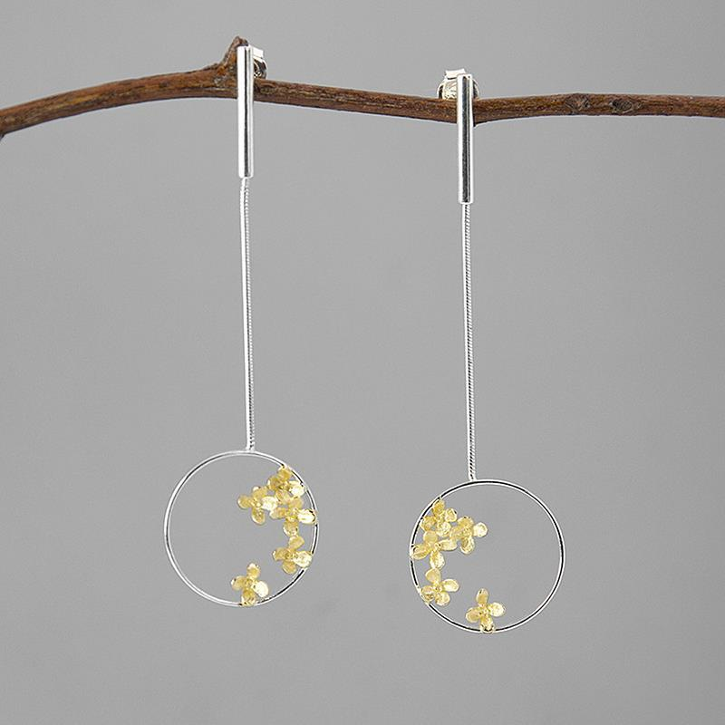 Aretes Colgantes de Flores en Plata